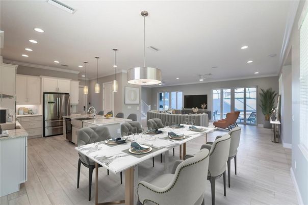 Dining room, Interior, Kitchen, Pendant Lights, Recessed Lighting, Stainless Steel Appliances, Wood Texture Flooring