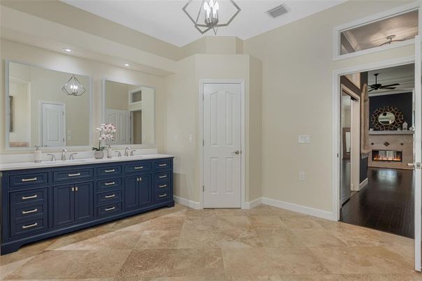 Bathroom, Dual Sink Vanities, Interior, Pendant Lights, Recessed Lighting, Wood Texture Flooring
