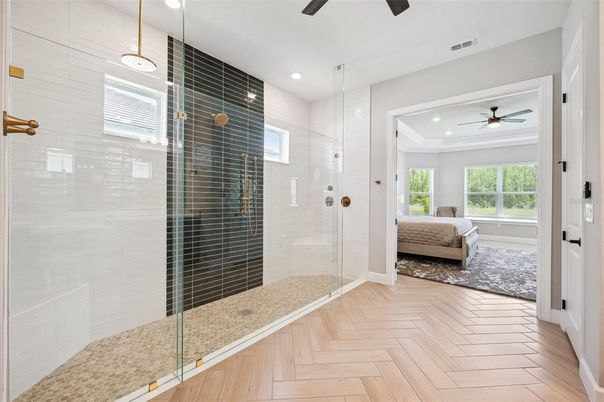 Bathroom, Bedroom, Glass Shower, Interior, Recessed Lighting, Wood Texture Flooring