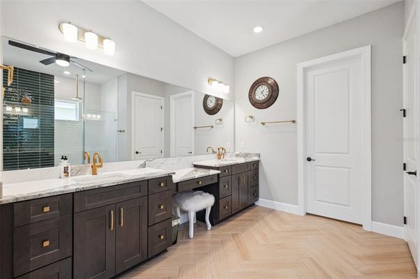 Bathroom, Dual Sink Vanities, Glass Shower, Interior, Recessed Lighting, Wood Texture Flooring