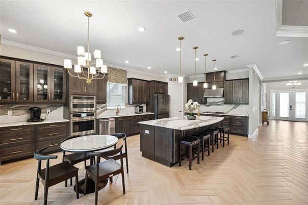 Chandelier, Interior, Kitchen, Pendant Lights, Recessed Lighting, Stainless Steel Appliances, Wood Texture Flooring