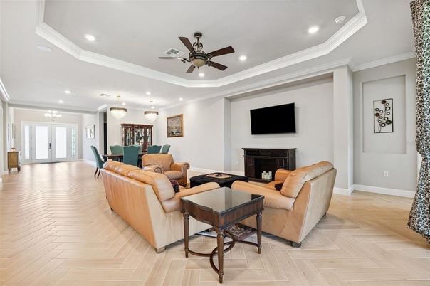 Dining room, Fireplace, Interior, Living room, Pendant Lights, Recessed Lighting, Wood Texture Flooring