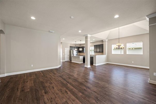 Chandelier, Empty room, Interior, Kitchen, Pendant Lights, Recessed Lighting, Wood Texture Flooring