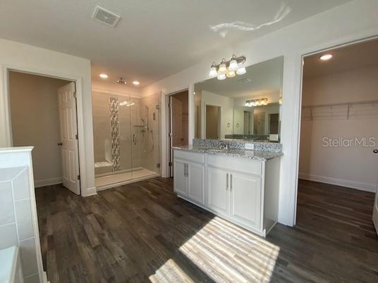 Bathroom, Glass Shower, Interior, Recessed Lighting, Wood Texture Flooring