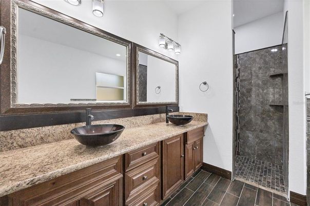 Bathroom, Dual Sink Vanities, Glass Shower, Interior, Wood Texture Flooring