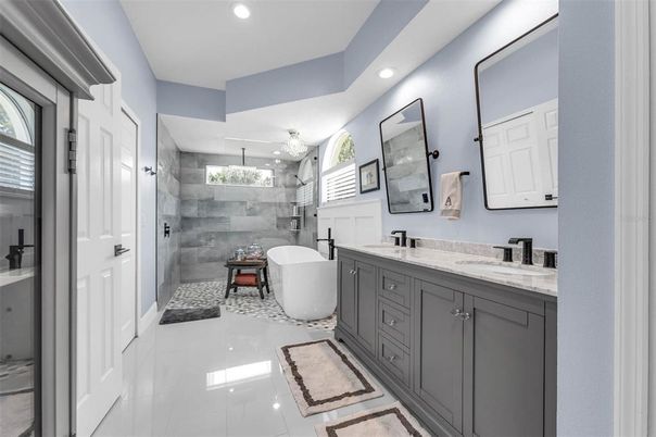 Bathroom, Chandelier, Dual Sink Vanities, Free Standing Baths, Glass Shower, Interior, Recessed Lighting