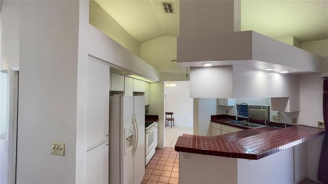 Interior, Kitchen, Recessed Lighting, Tile Countertops