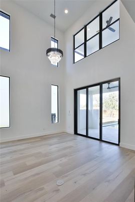 Chandelier, Empty room, Interior, Recessed Lighting, Wood Texture Flooring