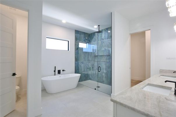 Bathroom, Dual Sink Vanities, Free Standing Baths, Glass Shower, Interior, Recessed Lighting