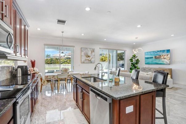 Dining room, Interior, Kitchen, Marble, Pendant Lights, Recessed Lighting, Stainless Steel Appliances