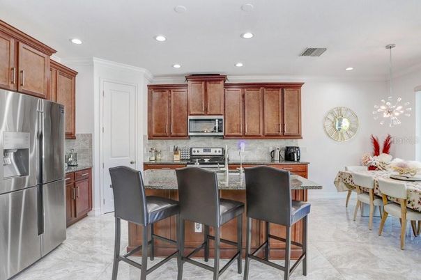 Dining room, Interior, Kitchen, Marble, Pendant Lights, Recessed Lighting, Stainless Steel Appliances