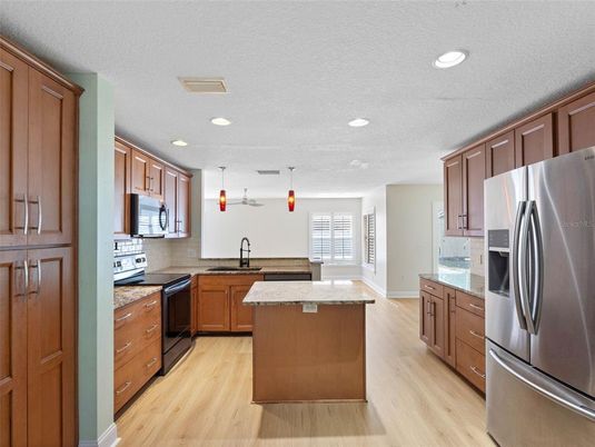 Interior, Kitchen, Pendant Lights, Recessed Lighting, Stainless Steel Appliances, Wood Texture Flooring