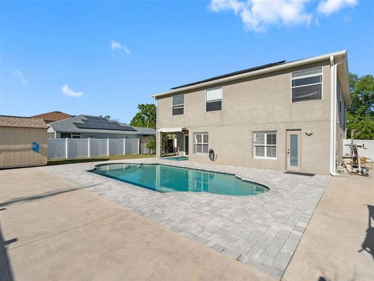 Exterior, Pool, Solar Panels