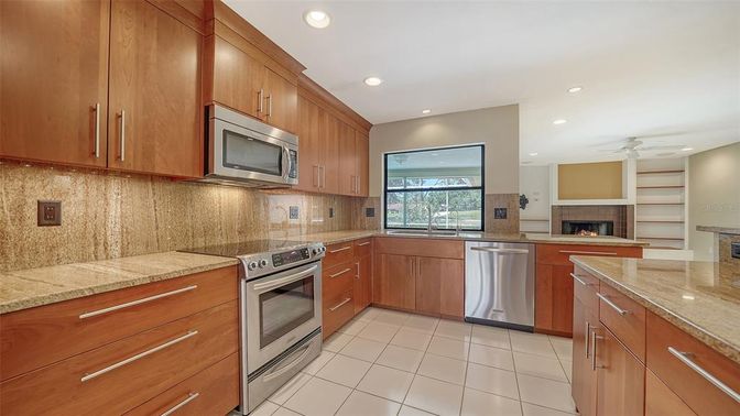 Fireplace, Interior, Kitchen, Recessed Lighting, Stainless Steel Appliances