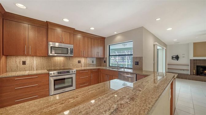 Fireplace, Interior, Kitchen, Recessed Lighting, Stainless Steel Appliances