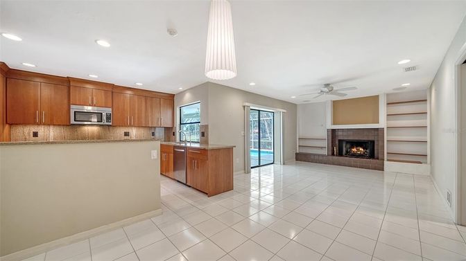 Fireplace, Interior, Kitchen, Pendant Lights, Recessed Lighting, Stainless Steel Appliances