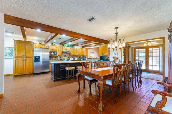 Chandelier, Dining room, Interior, Kitchen, Pendant Lights, Recessed Lighting, Stainless Steel Appliances, Wooden Beams
