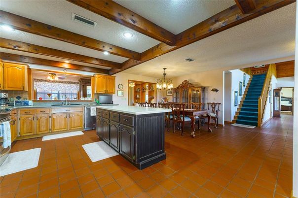 Chandelier, Dining room, Interior, Kitchen, Recessed Lighting, Stainless Steel Appliances, Wooden Beams