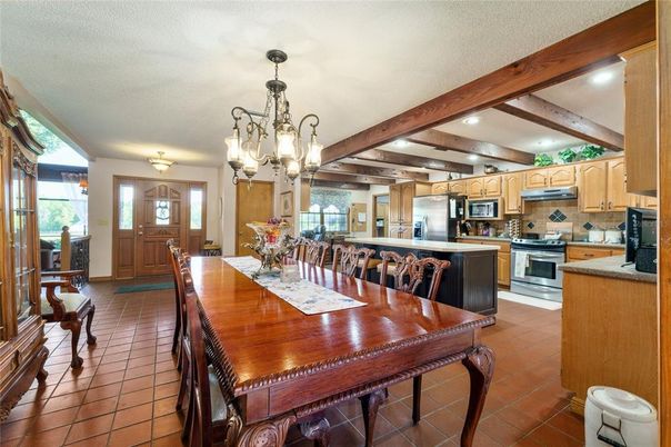 Chandelier, Dining room, Interior, Kitchen, Recessed Lighting, Stainless Steel Appliances, Wooden Beams