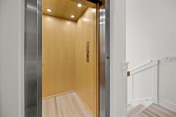 Elevator, Interior, Recessed Lighting, Wooden Ceilings, Wood Texture Flooring, Wooden Walls