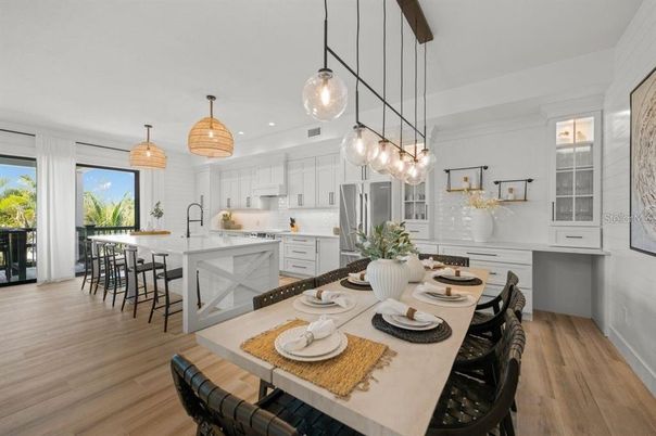 Dining room, Interior, Kitchen, Pendant Lights, Recessed Lighting, Stainless Steel Appliances, Wood Texture Flooring