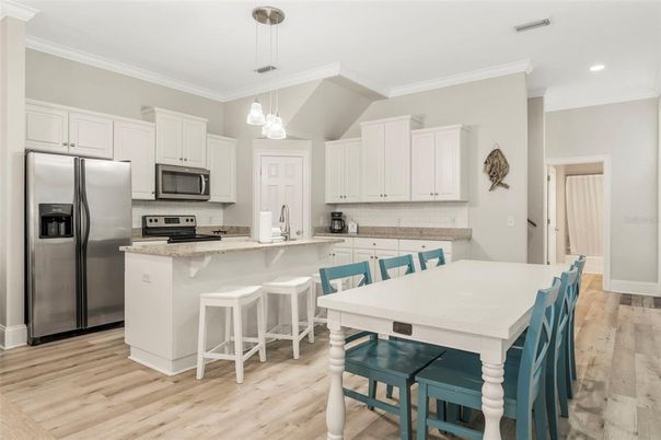 Interior, Kitchen, Pendant Lights, Recessed Lighting, Stainless Steel Appliances, Wood Texture Flooring