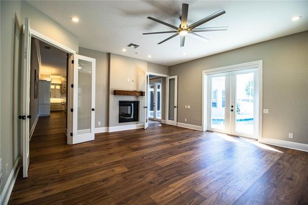 Empty room, Fireplace, Interior, Recessed Lighting, Wood Texture Flooring