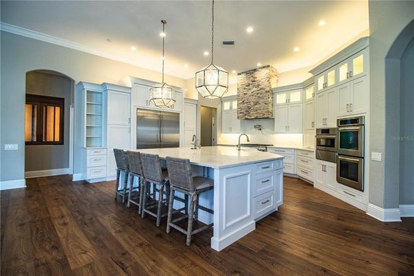 Interior, Kitchen, Pendant Lights, Recessed Lighting, Stainless Steel Appliances, Wood Texture Flooring