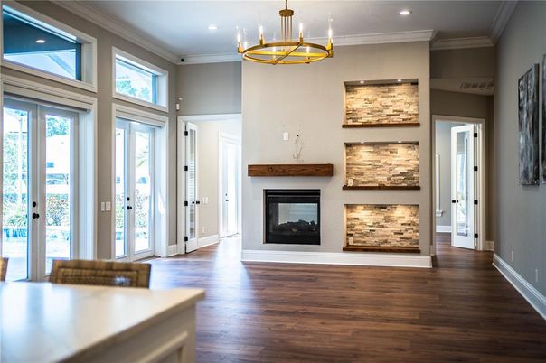Fireplace, Interior, Pendant Lights, Recessed Lighting, Wood Texture Flooring