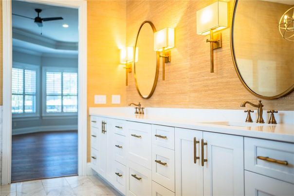 Bathroom, Dual Sink Vanities, Interior, Marble, Recessed Lighting, Wood Texture Flooring