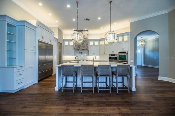 Chandelier, Interior, Kitchen, Pendant Lights, Recessed Lighting, Stainless Steel Appliances, Wood Texture Flooring