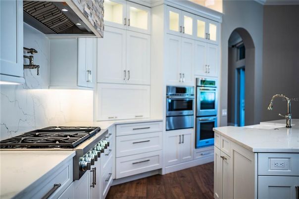 Interior, Kitchen, Marble Walls, Stainless Steel Appliances, Wood Texture Flooring
