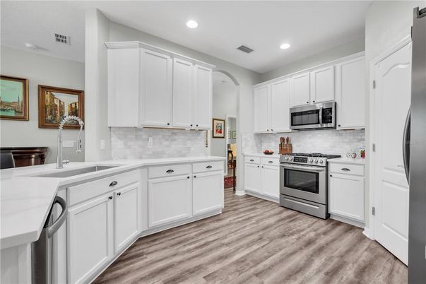 Interior, Kitchen, Recessed Lighting, Stainless Steel Appliances, Wood Texture Flooring