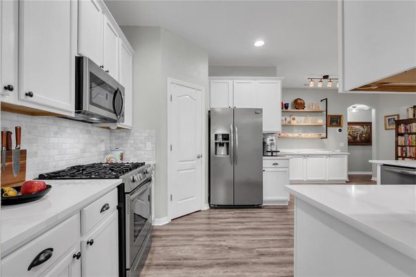 Interior, Kitchen, Recessed Lighting, Stainless Steel Appliances, Wood Texture Flooring