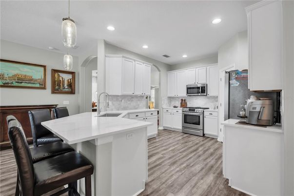 Interior, Kitchen, Pendant Lights, Recessed Lighting, Stainless Steel Appliances, Wood Texture Flooring