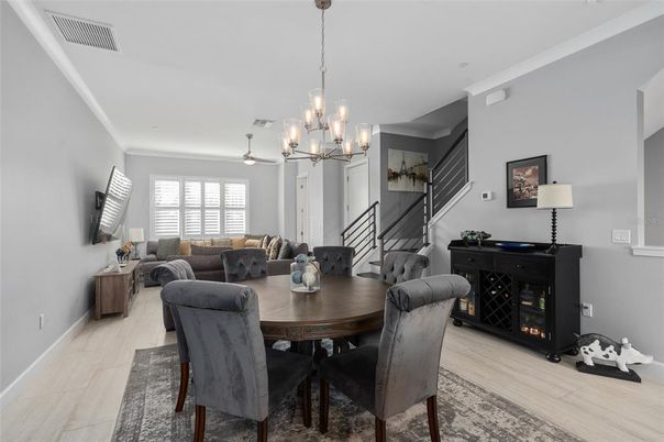 Chandelier, Dining room, Fireplace, Interior, Living room, Pendant Lights, Wood Texture Flooring