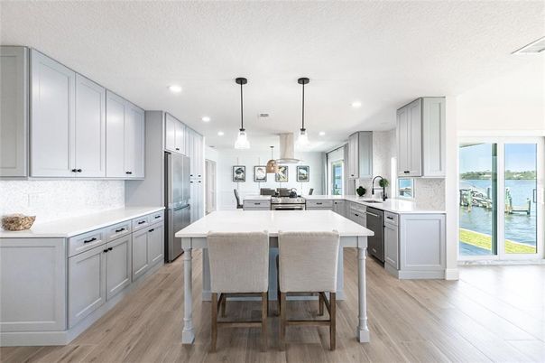 Interior, Kitchen, Pendant Lights, Recessed Lighting, Stainless Steel Appliances, Water, Wood Texture Flooring