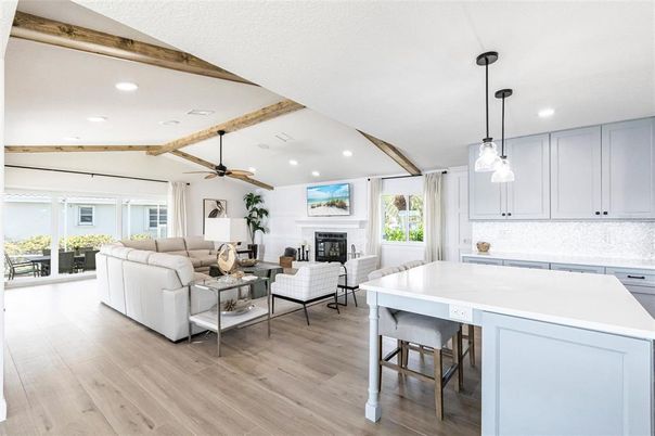 Fireplace, Interior, Kitchen, Living room, Pendant Lights, Recessed Lighting, Wooden Beams, Wood Texture Flooring