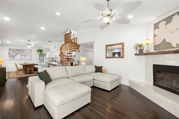 Dining room, Fireplace, Interior, Living room, Recessed Lighting, Wood Texture Flooring