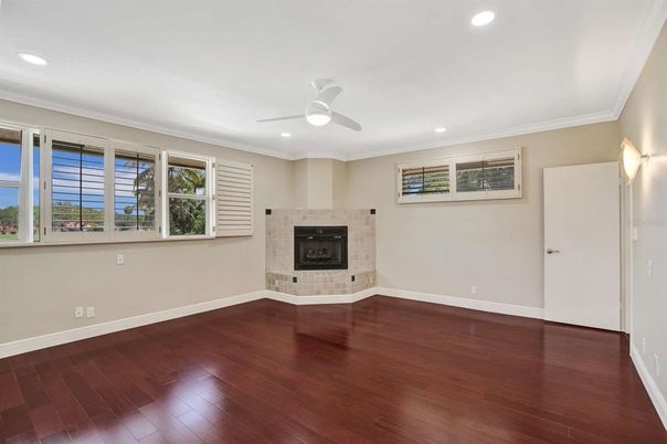 Empty room, Fireplace, Interior, Recessed Lighting, Water, Wood Texture Flooring