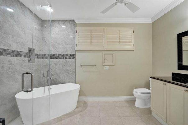Bathroom, Free Standing Baths, Glass Shower, Interior, Marble Walls, Recessed Lighting