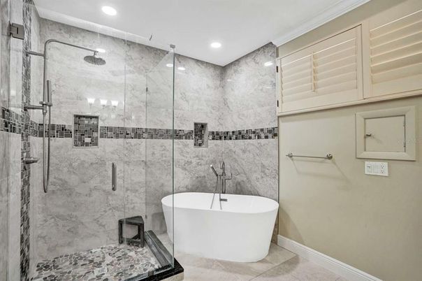 Bathroom, Free Standing Baths, Glass Shower, Interior, Marble Walls, Recessed Lighting