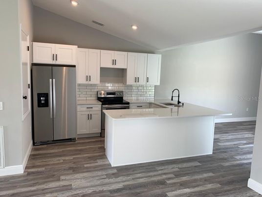 Interior, Kitchen, Recessed Lighting, Stainless Steel Appliances, Wood Texture Flooring