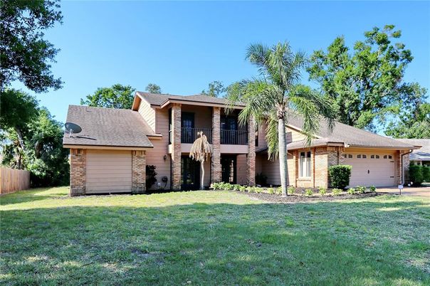 Attached, Backyard, Exterior, Facade, Brick Facade, Split Level