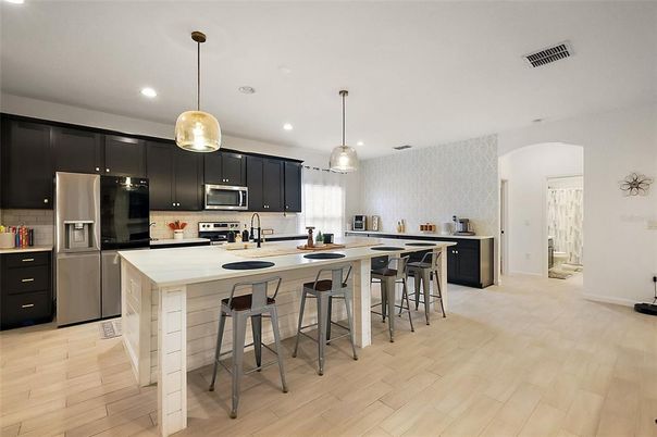 Interior, Kitchen, Pendant Lights, Recessed Lighting, Stainless Steel Appliances, Wood Texture Flooring