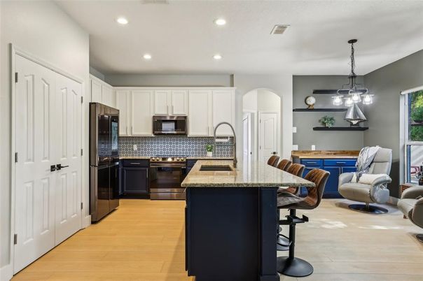 Interior, Kitchen, Pendant Lights, Recessed Lighting, Stainless Steel Appliances, Wood Texture Flooring