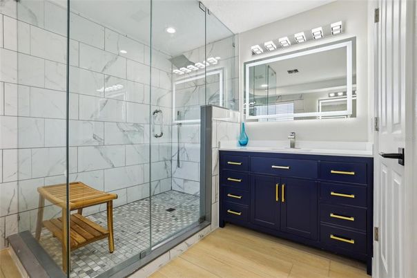 Bathroom, Glass Shower, Interior, Marble Walls, Recessed Lighting, Wood Texture Flooring