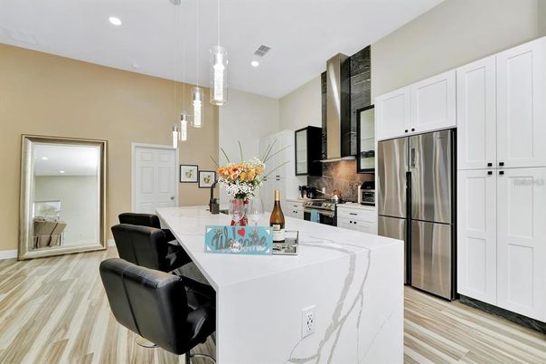 Interior, Kitchen, Pendant Lights, Recessed Lighting, Stainless Steel Appliances, Wood Texture Flooring