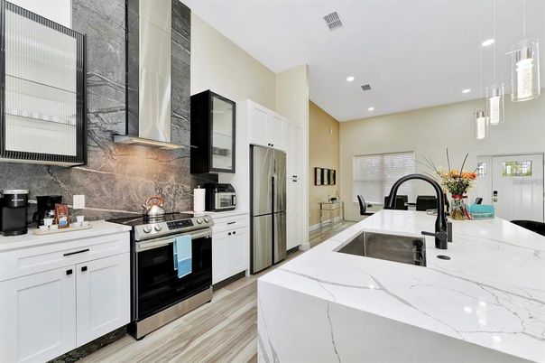 Interior, Kitchen, Pendant Lights, Recessed Lighting, Stainless Steel Appliances, Wood Texture Flooring