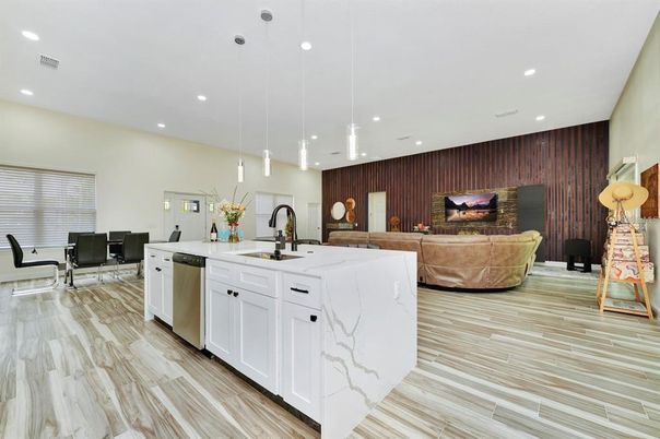 Dining room, Interior, Kitchen, Living room, Pendant Lights, Recessed Lighting, Stainless Steel Appliances, Wood Texture Flooring